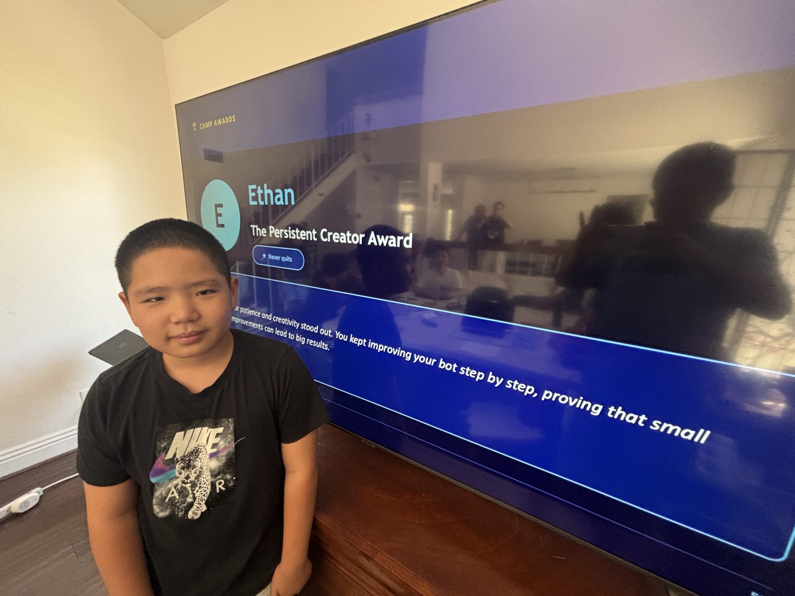 Ethan receiving The Persistent Creator Award