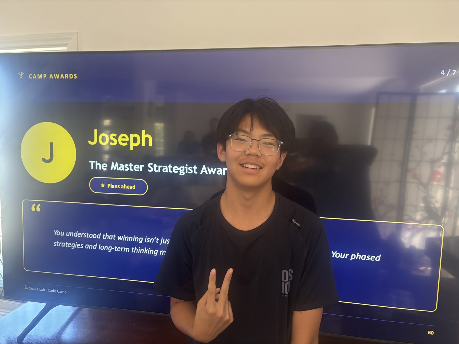 Joseph receiving The Master Strategist Award