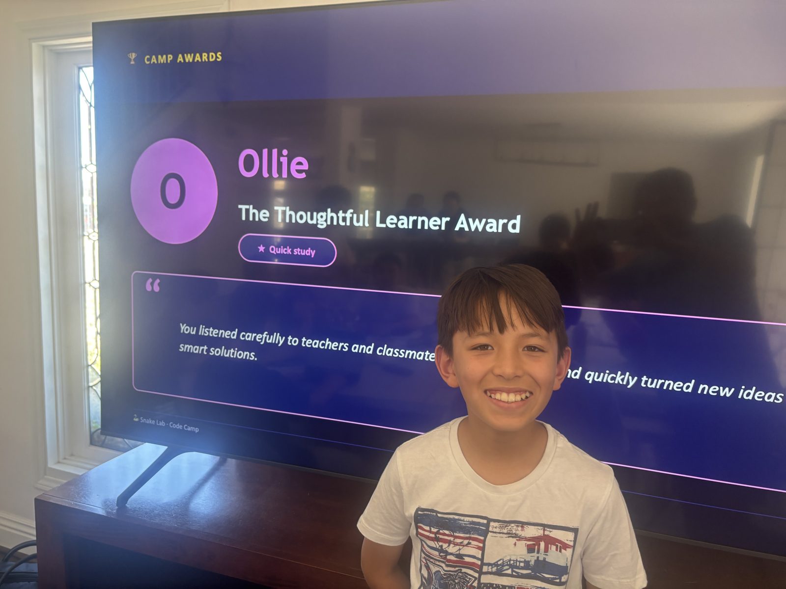 Ollie receiving The Thoughtful Learner Award
